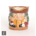 A Royal Doulton squat character jug entitled 'The Best is not too Good', the seated Toby holding a