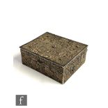 An early 20th Century Chinese silver rectangular silver box with filagree decoration and wooden