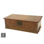 An 18th Century carved oak bible box initialled MT and dated 1752, 23cm x 39cm x 75.5cm.