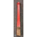 A Georgian red painted cast iron fence post, height 152cm.