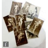 A collection of eight Edwardian real photographic studies of nude female images, postcard size. (8)