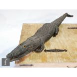 An early 20th Century taxidermy study of a crocodile, length 160cm, S/D.