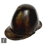 An English civil war period iron pikeman's helmet of small size, ribbed edges to front and back,
