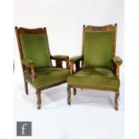 A pair of late Victorian easy chairs with carved foliate detail to the exposed beech frames,