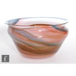 A Michael Rayner studio glass bowl of tapered shouldered form with everted rim, internally decorated