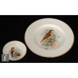 A small Royal Worcester pin dish decorated by W. Powell with a hand painted goldfinch, signed and