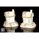 Two 19th Century Staffordshire two-part pastel burners, both with removable houses on pedestal