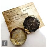 A George III wax seal in metal container with indenture relating to a land dispute in the Easter