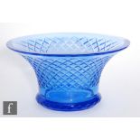 A 20th century blue vase of footed flared form, with diamond cut pattern, unmarked height 11cm.