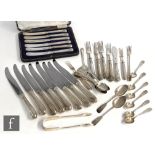 A small parcel lot of assorted hallmarked silver and white metal flatware to include a cased set
