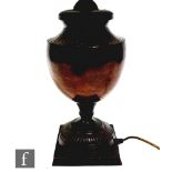 A 20th Century bronze table lamp of half fluted and plain form, with shade 64cm.