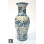 A Chinese blue and white soldier floor standing vase of baluster form extending to a flared rim, the