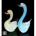 A Murano glass figure formed as a stylised swan, decorated in blue and opal cased in clear, height