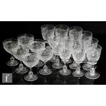 A Tudor part suite of drinking glasses, each glass decorated with a diamond and star cut band