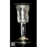 A 19th Century goblet in the 18th Century taste, the large bucket form bowl with everted rim above a