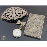 An early 20th Century filigree silver rectangular card case, length 9cm, with a silver nurse's