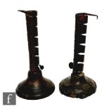 A near pair of 18th century spiral rat de cave candlesticks on domed wooden bases, 18.5cm, (2)