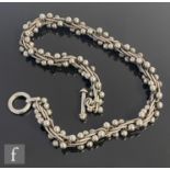A modern silver fancy link rope twist chain detailed with shot decoration throughout, terminating in