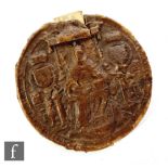 A Charles I or II great wax seal with indenture attached in Latin, depicting seated on a throne