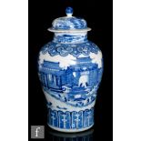 A 19th Century Chinese Summer Palace baluster vase and cover, the body painted with continuous scene