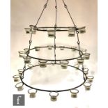 A modern 17th Century style iron tea light candle holder frame with lights, diameter 70cm.