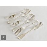 A composed set of six hallmarked silver fiddle pattern dinner forks, total weight 15.5oz, circa