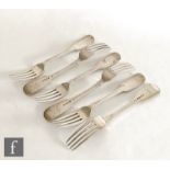 A set of six hallmarked silver fiddle pattern dinner forks each with engraved crest to terminal