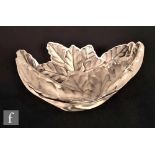 A Lalique Compiegne clear and frosted glass bowl, of oval section, moulded with oak leaves to the
