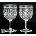 A pair of early 20th Century Stuart & Sons wine glasses, circa 1920s, each ovoid bowl with flared
