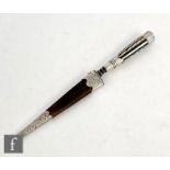 A late 19th Century silver handled and steel bladed dirk, with mother of pearl banded detail to