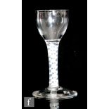 An 18th Century drinking glass circa 1770, the ovoid bowl above a double series opaque twist stem