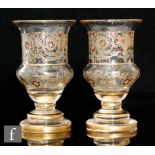 A pair of early 20th Century French glass vases, possibly Baccarat, enamelled in Ottoman Isnik style