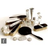 A parcel lot of assorted silver and silver mounted items to include seven hair brushes, six