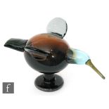 An Oiva Toikka for Iittala glass bird figure modelled as a Festive Catcher, with cinnamon body,
