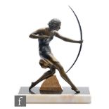 A 1930s Uriano Art Deco patinated spelter figure 'Diana The Huntress' raised on a rectangular