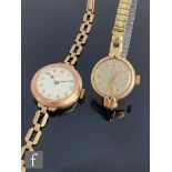 An early 20th Century 9ct hallmarked lady's wrist watch to a 9ct bracelet, total weight 23.5g,