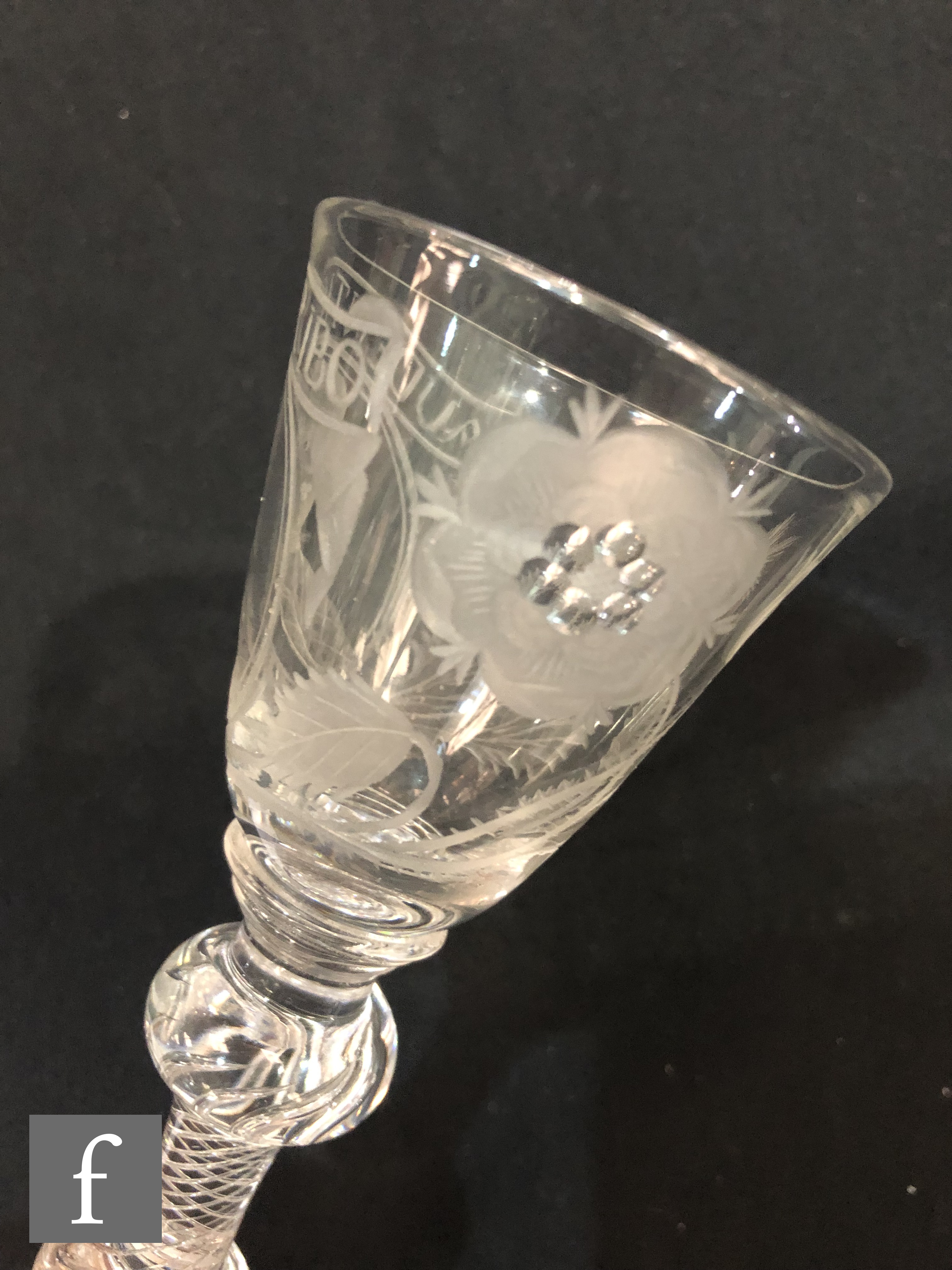 An 18th Century drinking glass circa 1750, the round funnel bowl engraved with a head and - Image 13 of 16