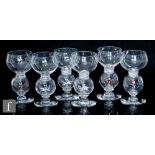 A set of six 1930s Stevens & Williams clear crystal glass drinking glasses with a cup form bowl