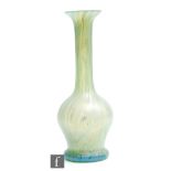 A late 19th Century Kralik glass vase of footed globe and shaft form with a tall slender neck and