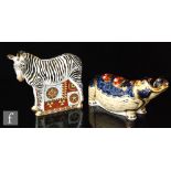 Two boxed Royal Crown Derby paperweights comprising a Hippopotamus and a Zebra, both with gold