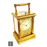 A late 19th Century French carriage clock with push button repeat, the case with reeded pilaster