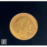 An Edward VII half sovereign dated 1908.