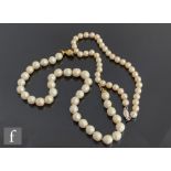 A single row of baroque pearls, length 50cm, each pearl diameter approximately 11mm to 12mm,