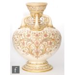 A late 19th Century Royal Worcester vase, the bulbous body with Persian type decoration in tones
