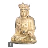 An 18th/19th Century Sino-Tibetan gilt bronze/copper alloy figure of a seated Amitayus, hands cast