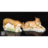 Two boxed Royal Crown Derby paperweights comprising Lioness and Sumatran Tigress, both with gold