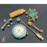 A small parcel lot of assorted jewellery items to include three 9ct brooches and a small clip, total