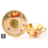 A later 20th Century Royal Worcester Fallen Fruits teacup and saucer decorated by Telford with