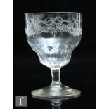 An 18th Century drinking glass circa 1790, the double ogee bowl engraved with garlands in the neo