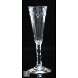 An 18th Century ale glass circa 1775, the funnel bowl engraved with a floral and OXO garland,